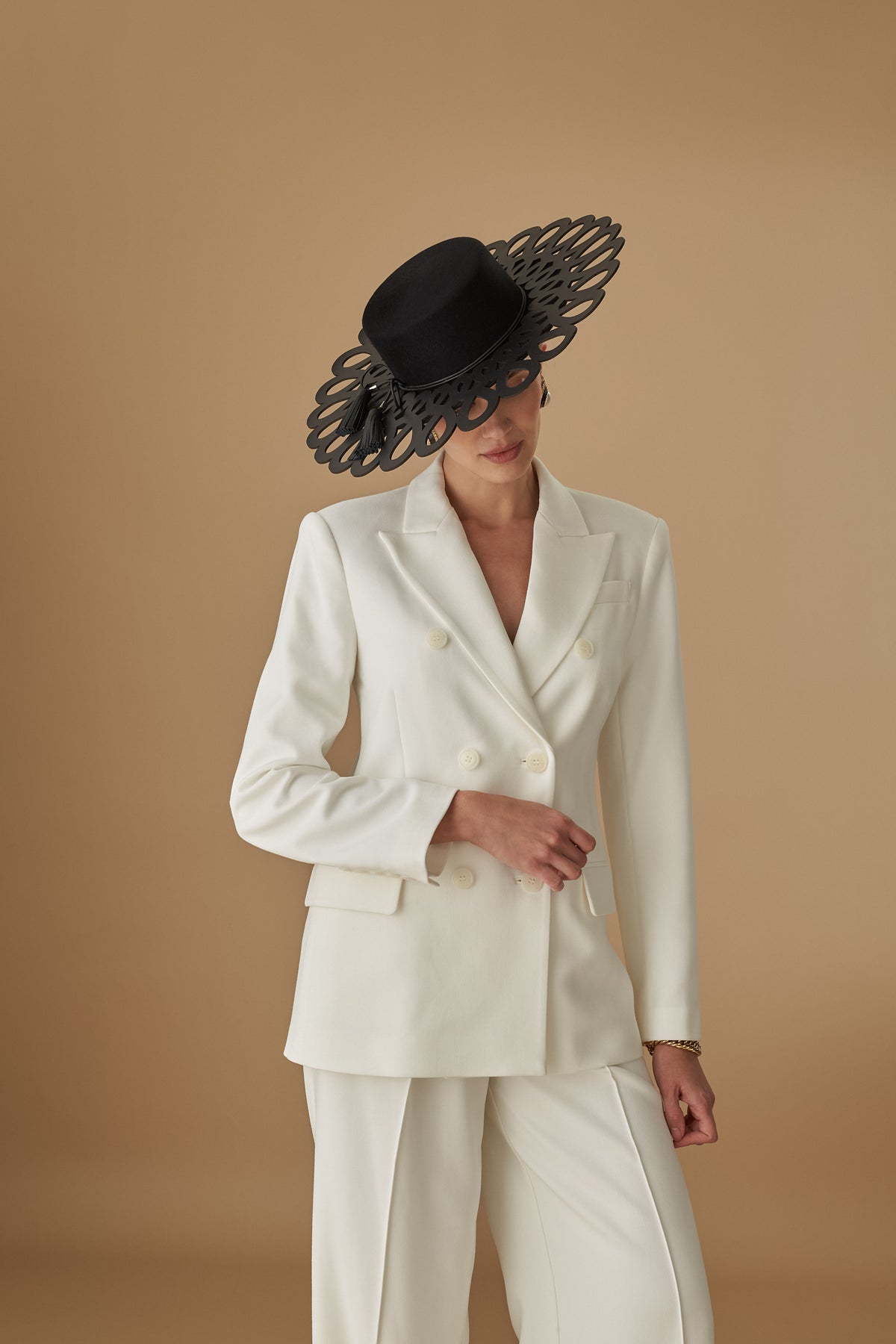 Black felt boater hat with a laser-cut leather wide brim