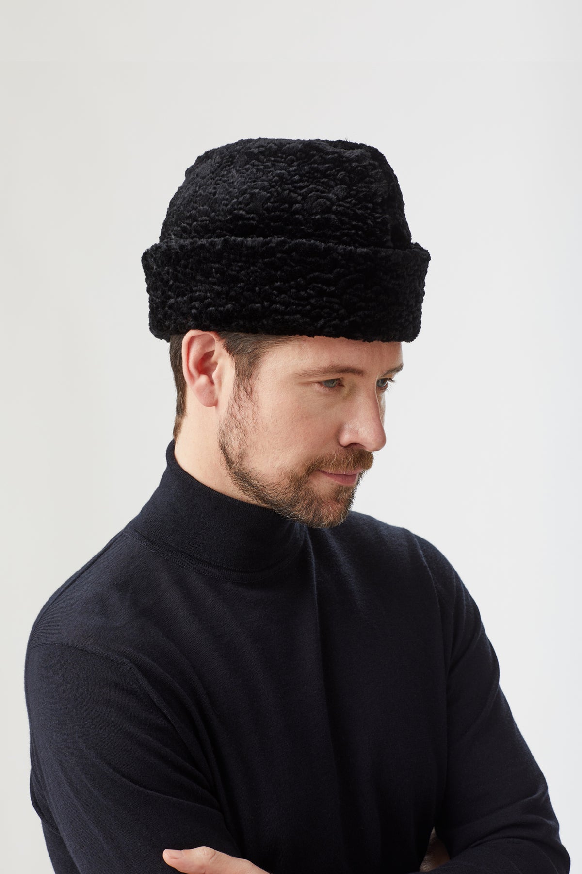 BLACK FAUX FUR KARAKUL HAT WITH INTERNAL EAR FLAPS