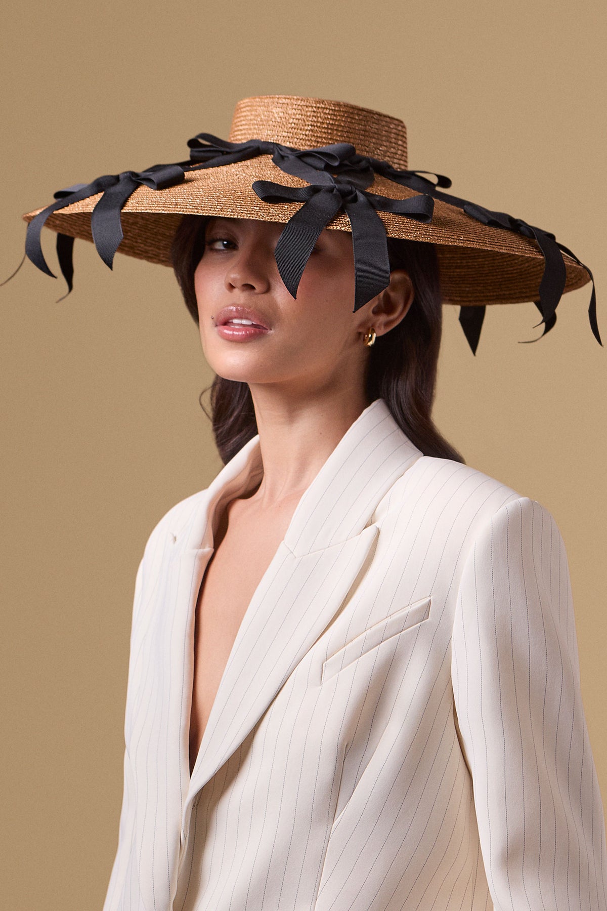Golden and black wide brim pedal straw percher
