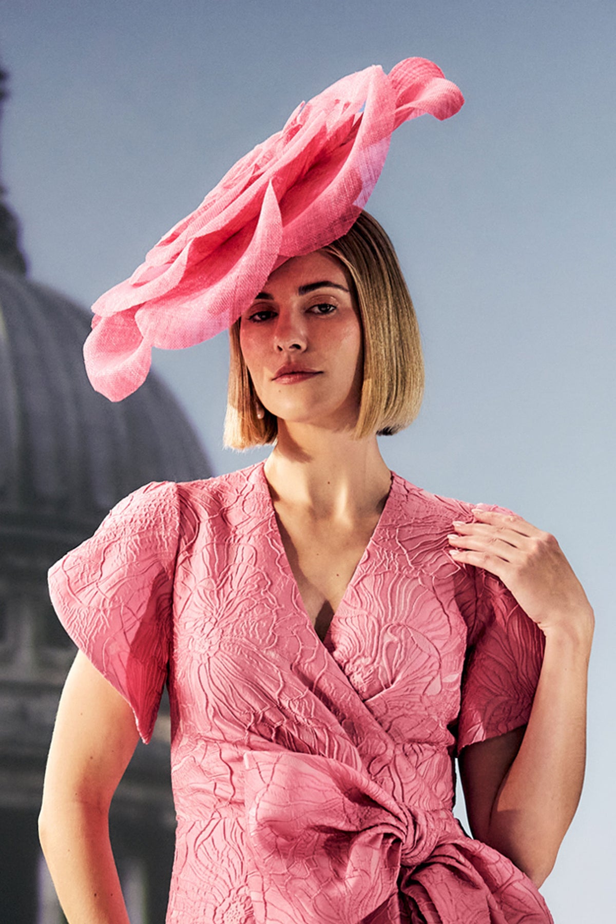 Women's oversized sinamay pink rose hat.