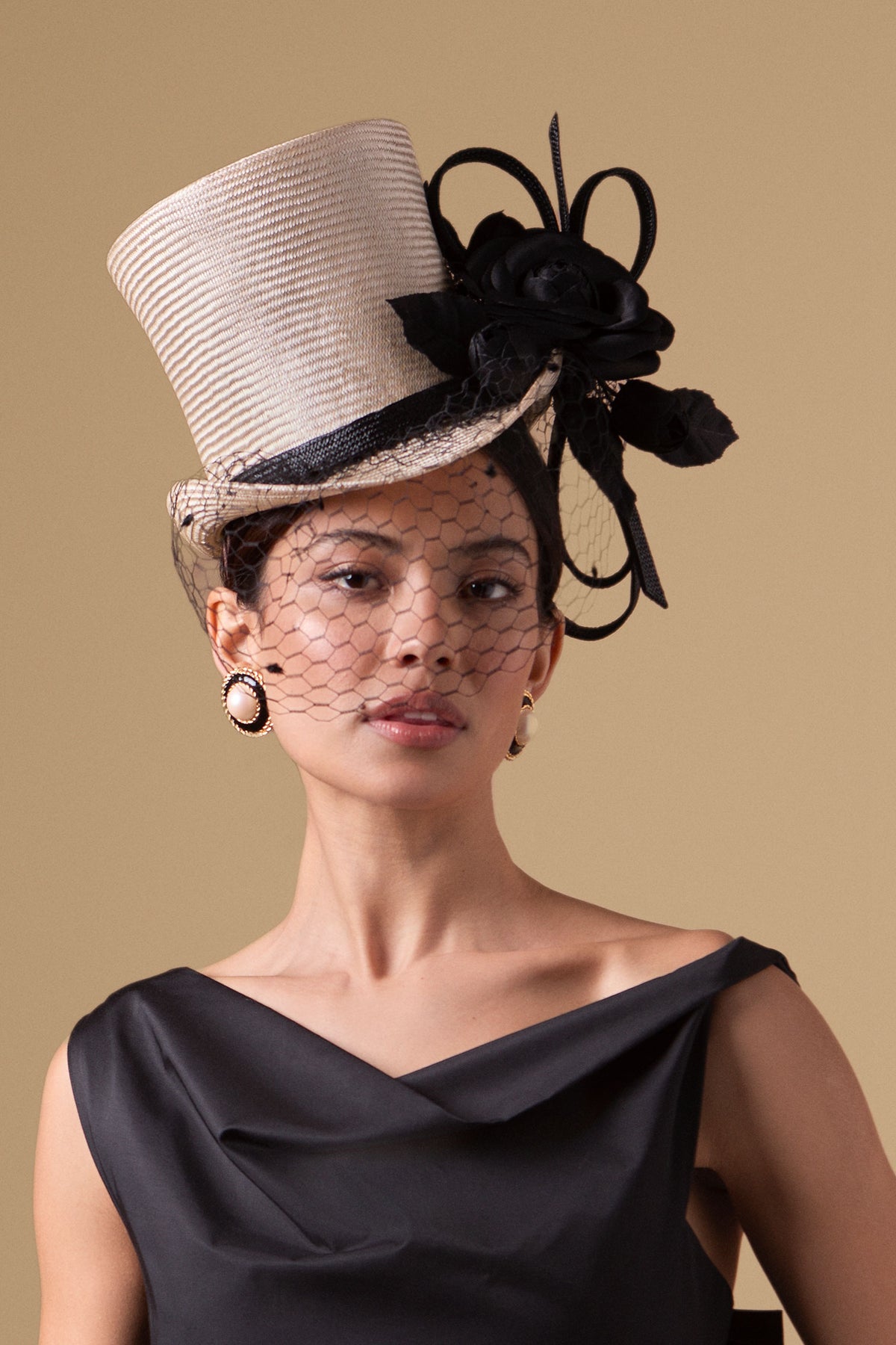 Natural parasisal straw top hat with black vintage veiling, silk camellias & straw loops