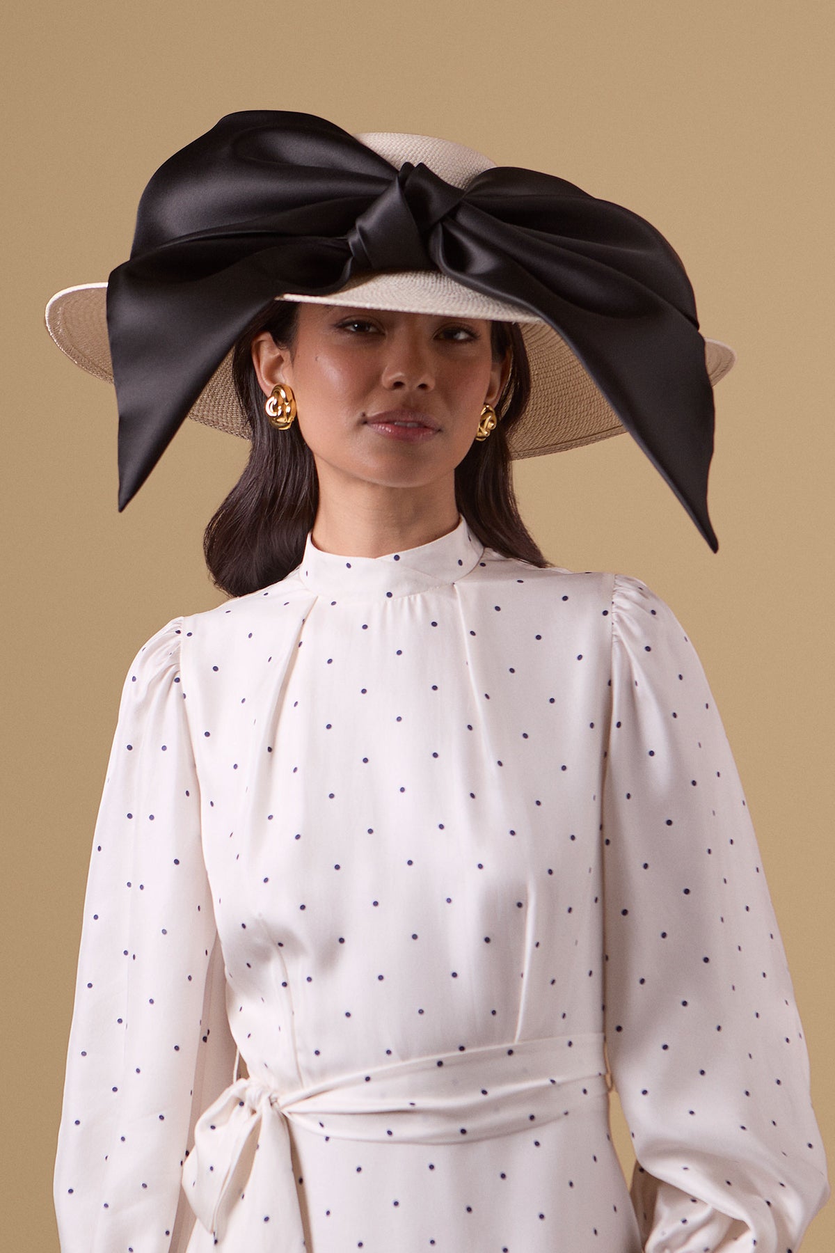 Ivory Panama straw wide-brim picture hat with an oversized silk gazor black bow