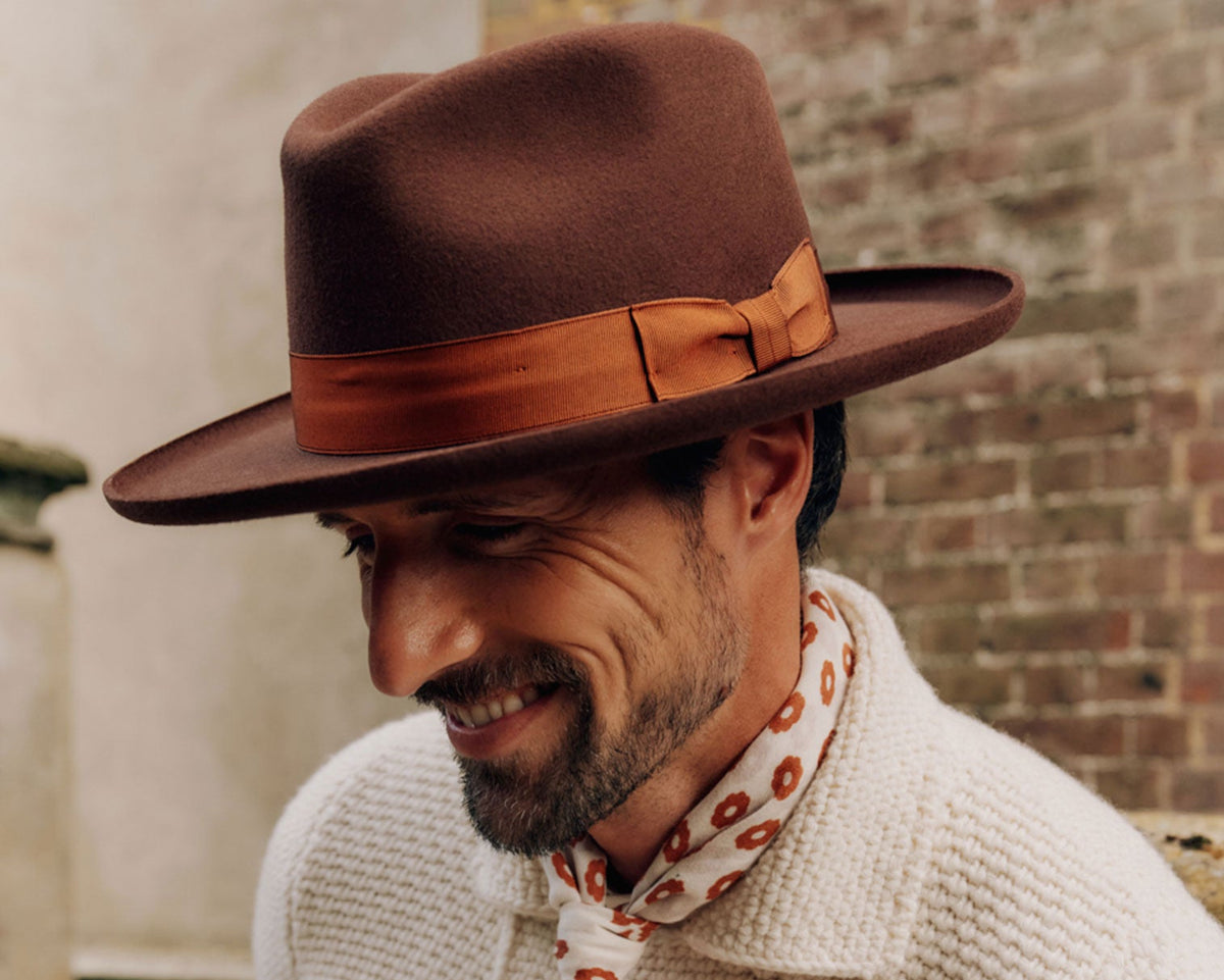 MENS RUST WOOL FEDORA HAT WITH A GROSGRAIN BURNT ORANGE BAND AND BOW AND A PENCIL BRIM