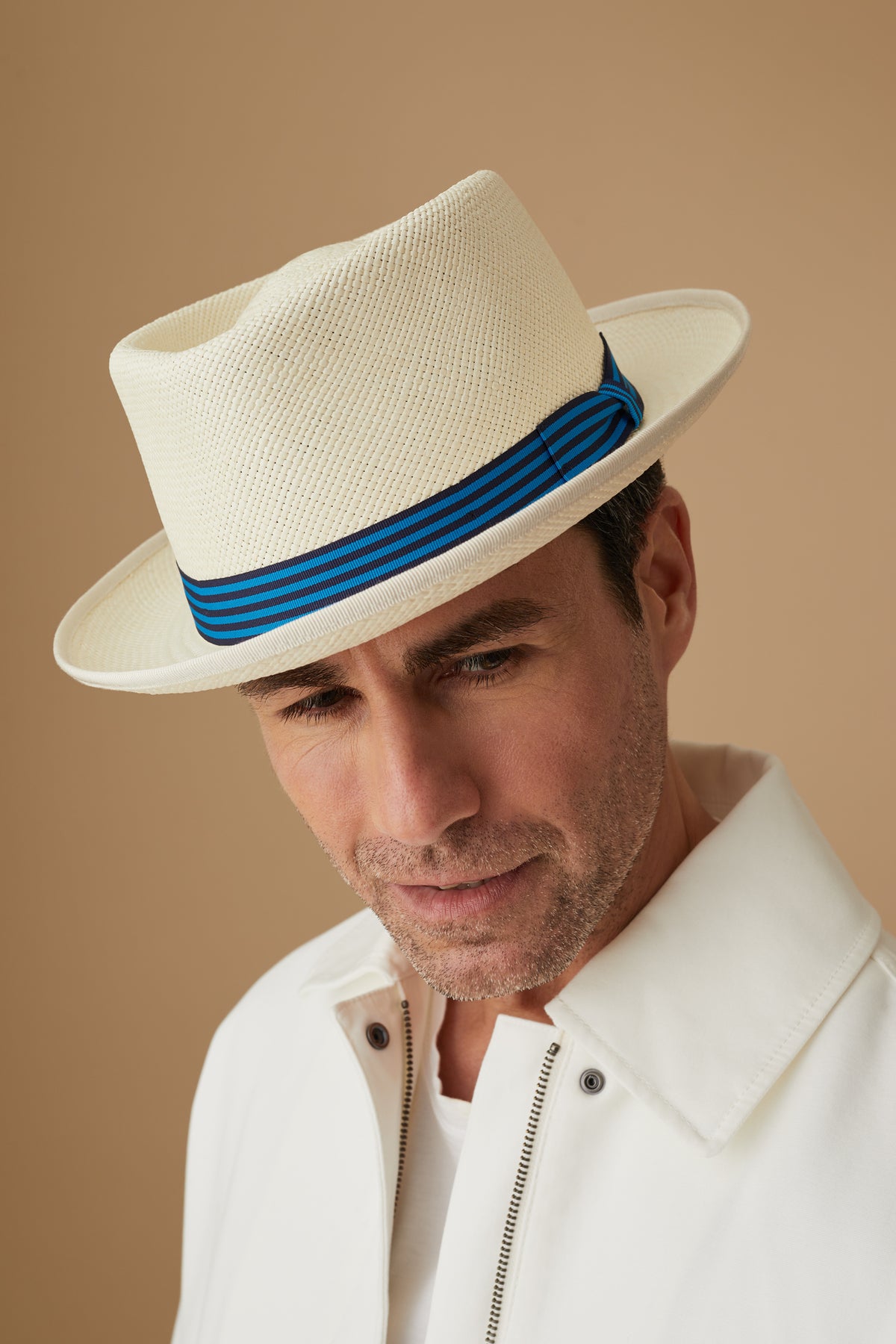 WHITE PANAMA HAT WITH A NAVY/BLUE STRIPED RIBBON
