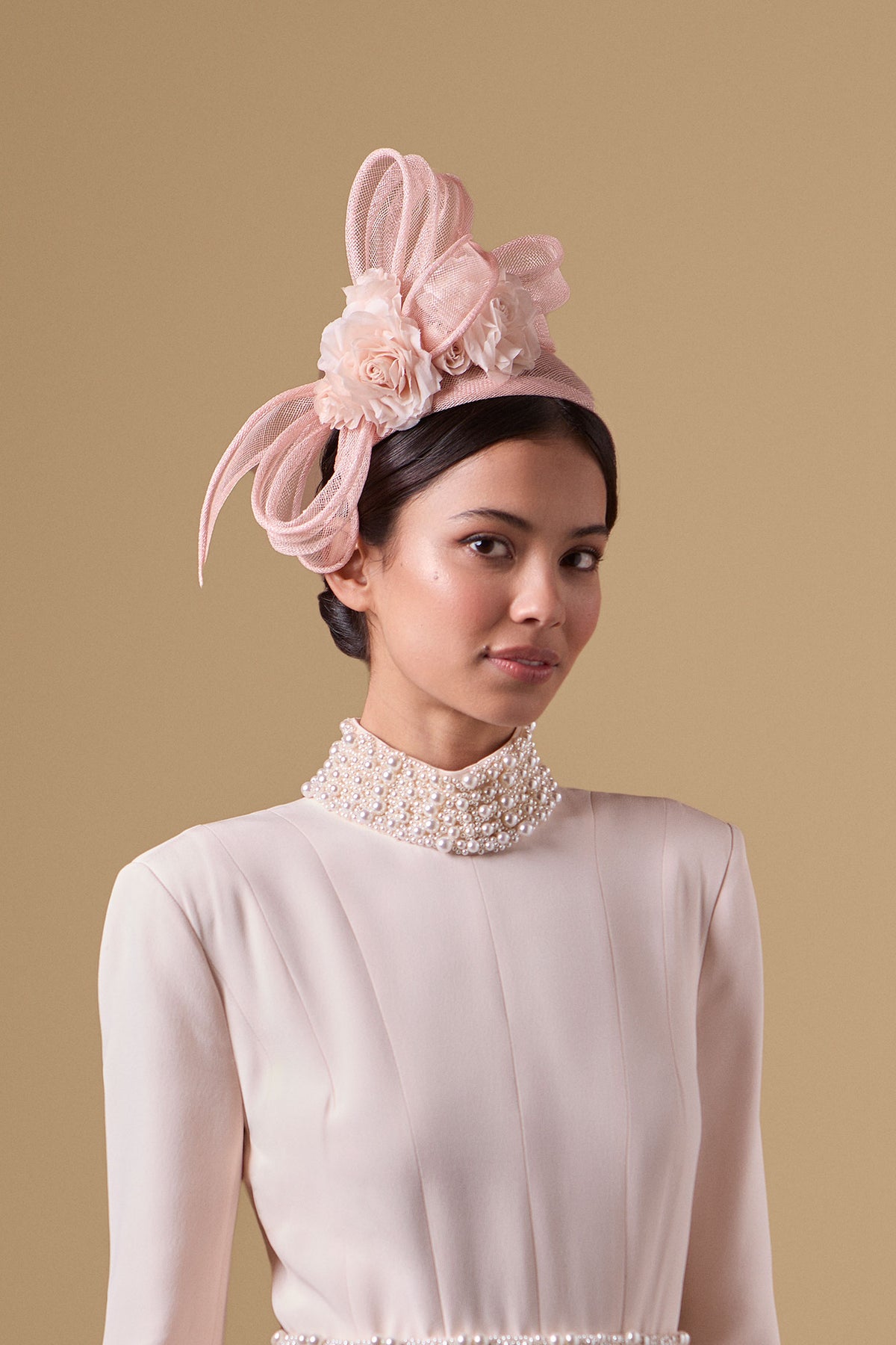 Pink Sinamay headband with silk habotai roses and a draped sinamay bow