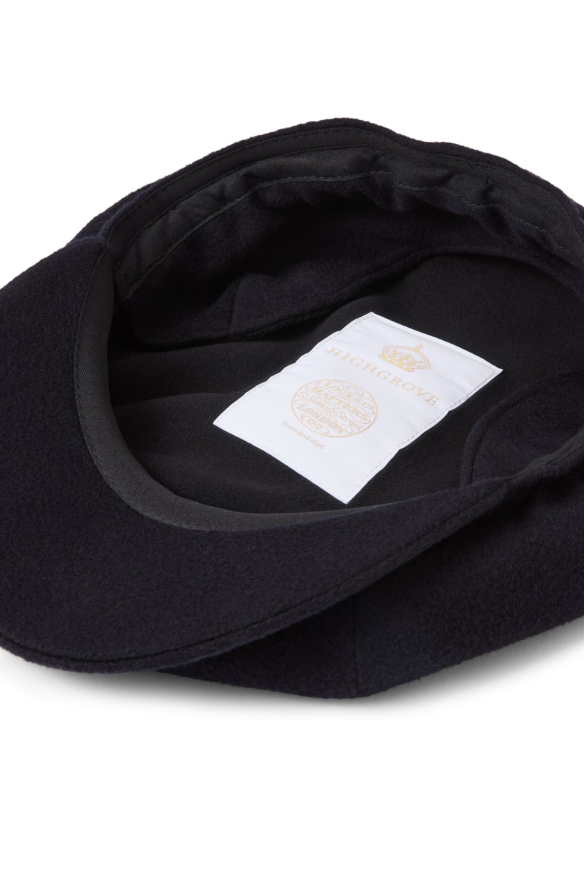 INSIDE OF NAVY CASHMERE 8 PANEL BAKERBOY CAP WITH EAR FLAPS