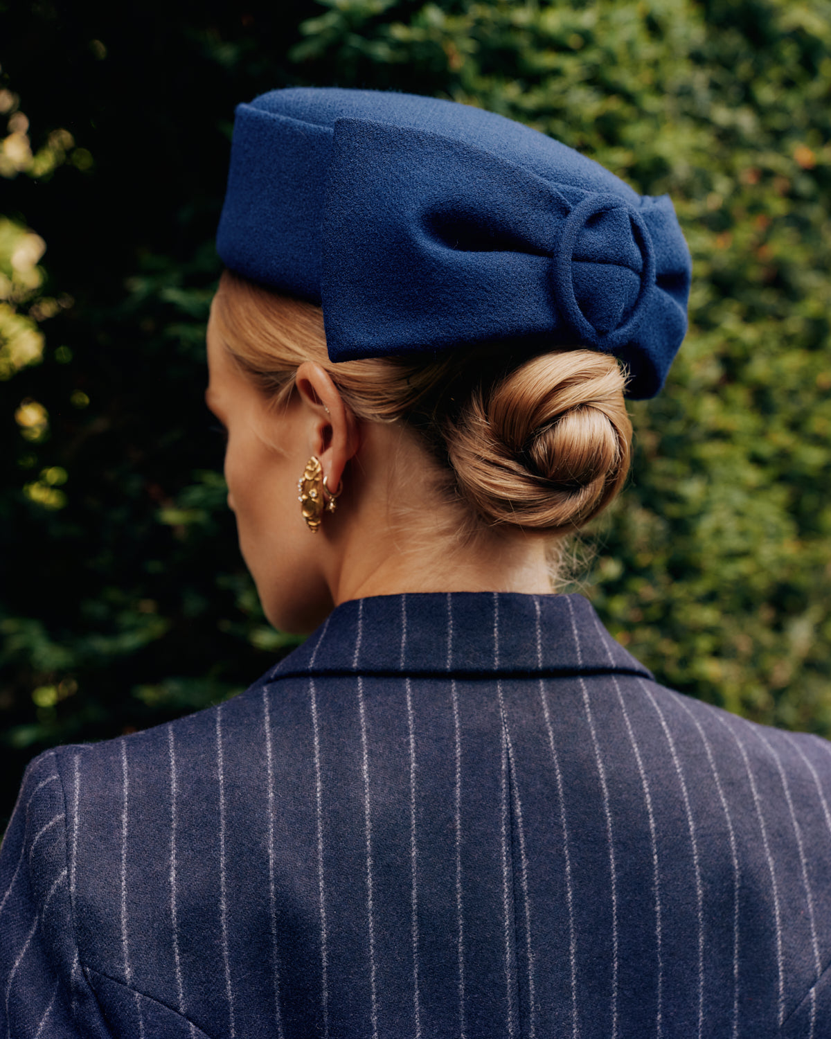 Couture Navy Wool Crepe Pillbox Hat with a back bow