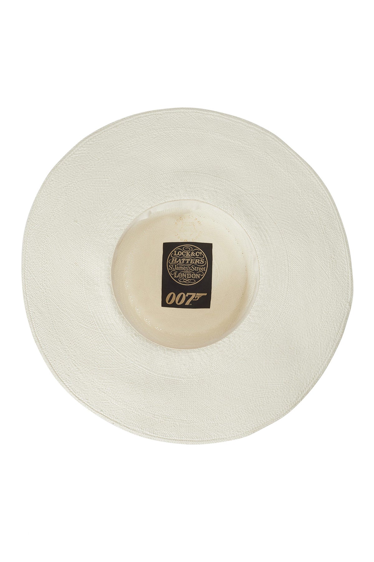 INSIDE OF WHITE PANAMA HAT FROM THE LOCK & CO. HATTERS X 007 BOND COLLECTION WITH BLACK & GOLD LOCK & CO. HATTERS X 007 LOGO - Lock & Co. Hatters London UK