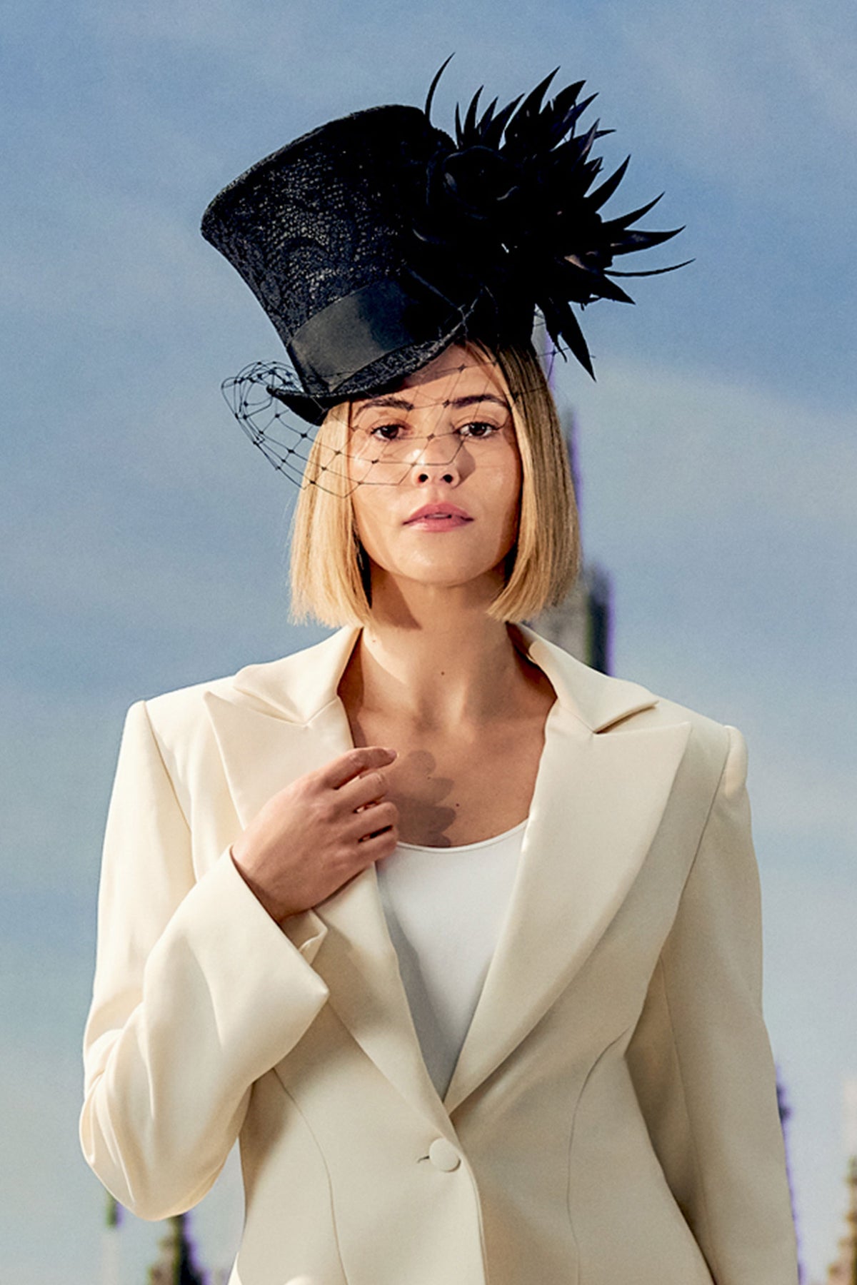 Women's black parasisal straw top hat with black lace, black silk roses, goose feathers and black veiling.