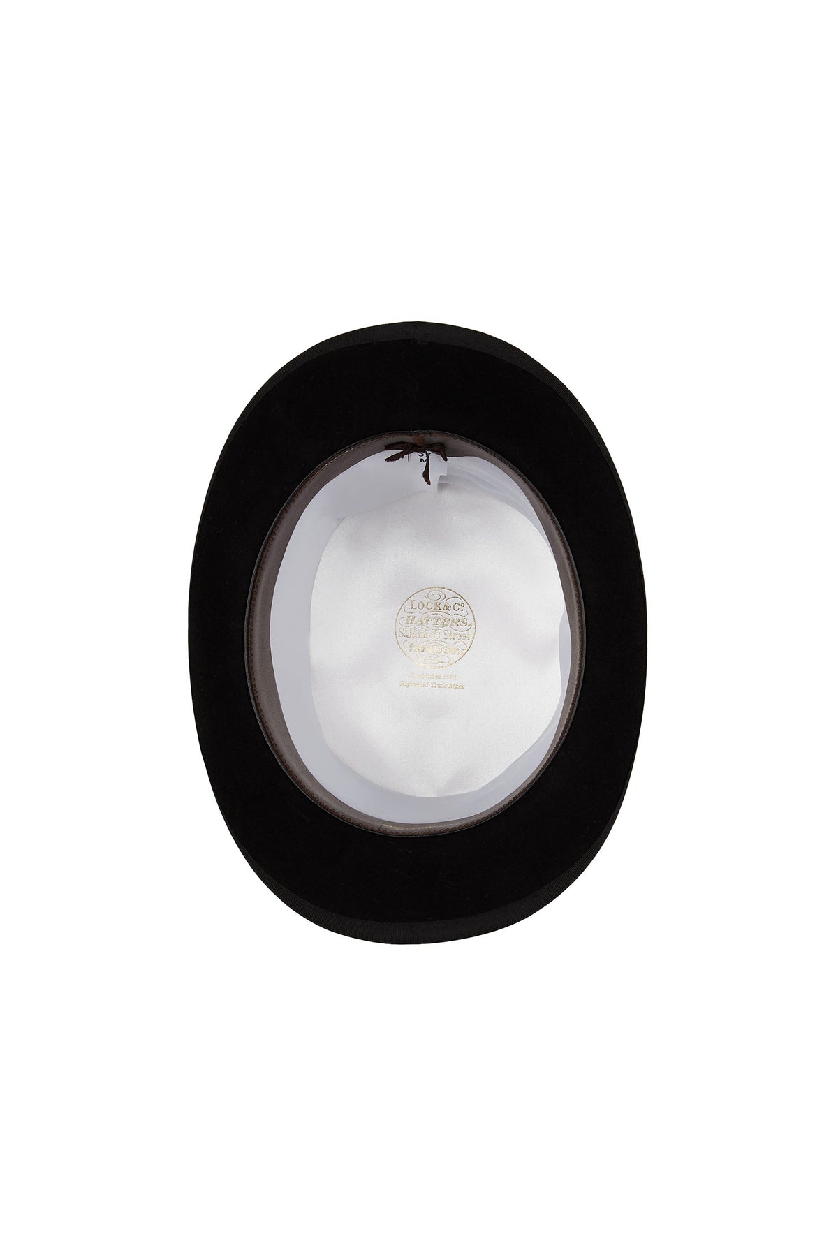 INSIDE OF BLACK FELT TOP HAT WITH WHITE LINING AND GOLDEN LOCK & CO. HATTERS LOGO