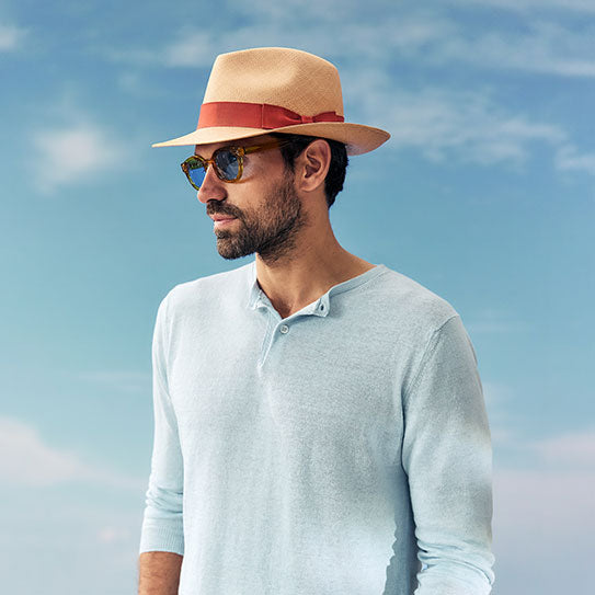 Unisex natural toquilla straw panama hat with a rust galoon ribbon