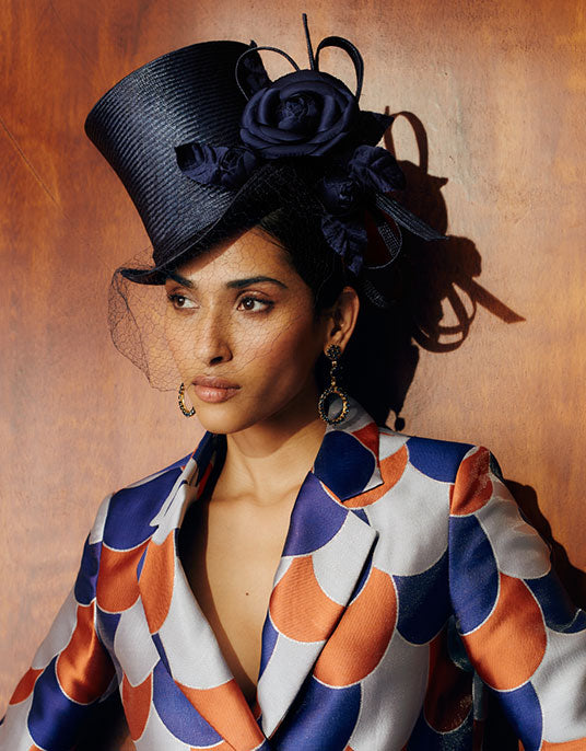 Navy parasisal straw top hat with vintage veiling, silk camellias & straw loops