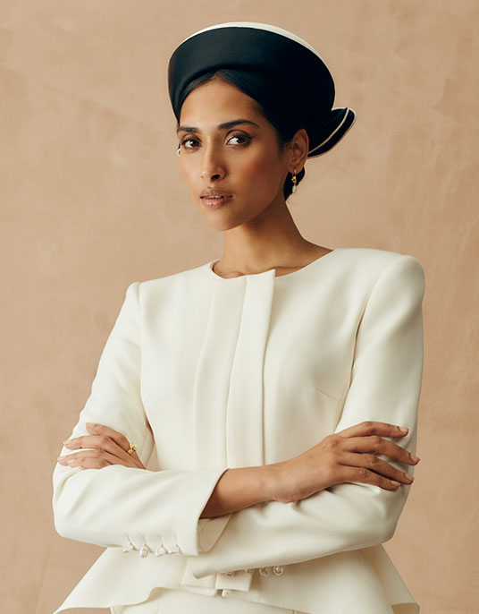 Black and white duchess satin pillbox with a bow at the back