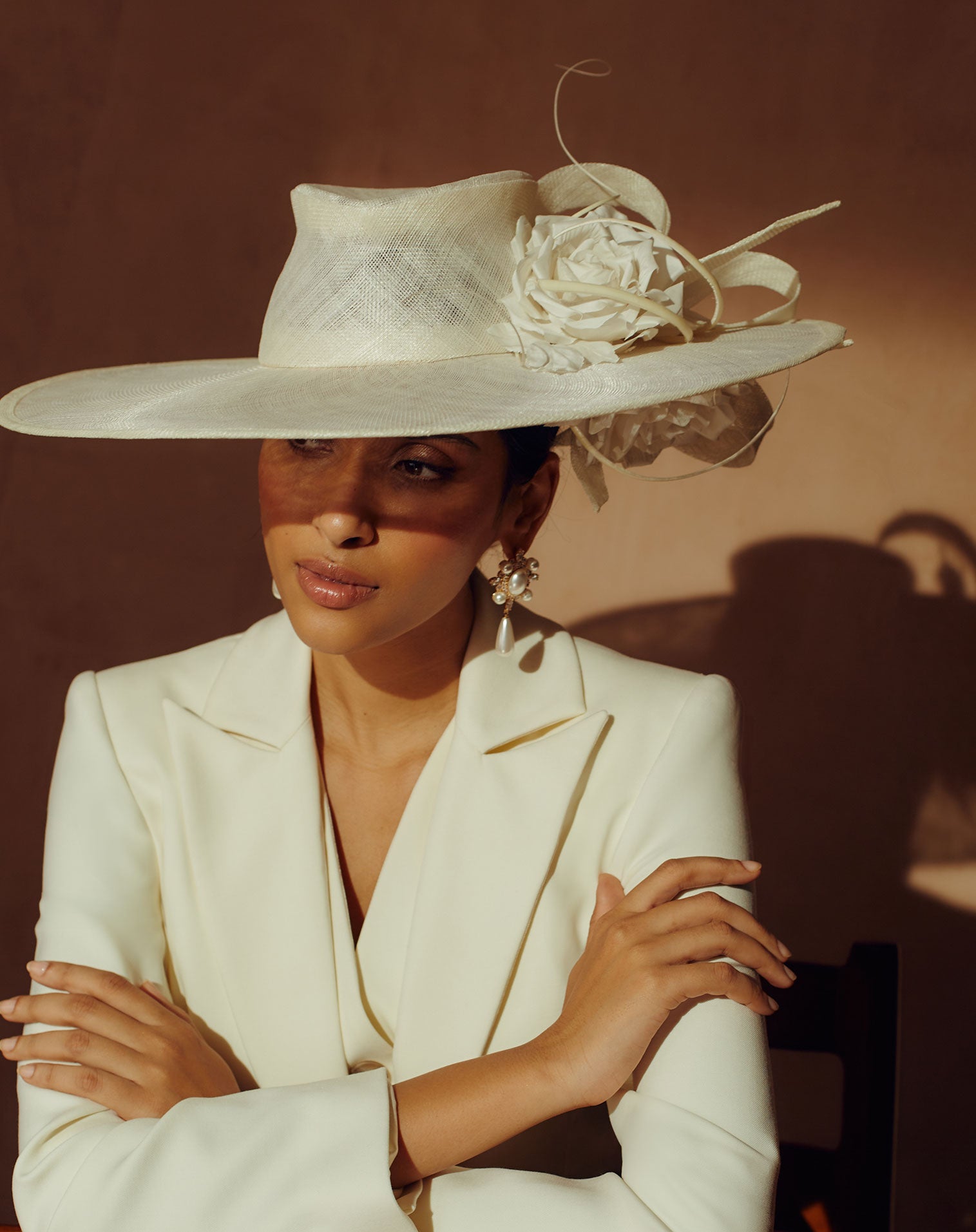 Ivory sinamay wide brim fedora hat with silk dupion roses