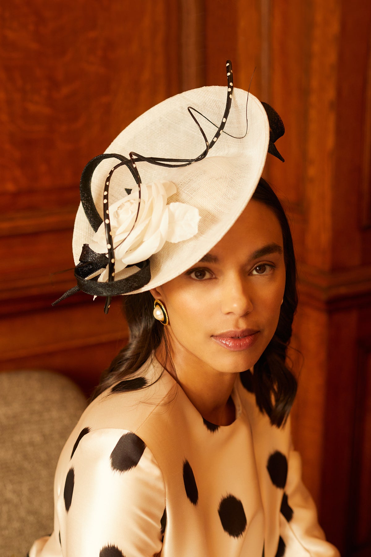 WOMEN&#39;S IVORY WHITE &amp; BLACK SINAMAY SAUCER HAT WITH POLKA DOT TWIRLING AND WHITE SILK CAMELLIA DETAILING - Lock & Co. Hatters London UK
            