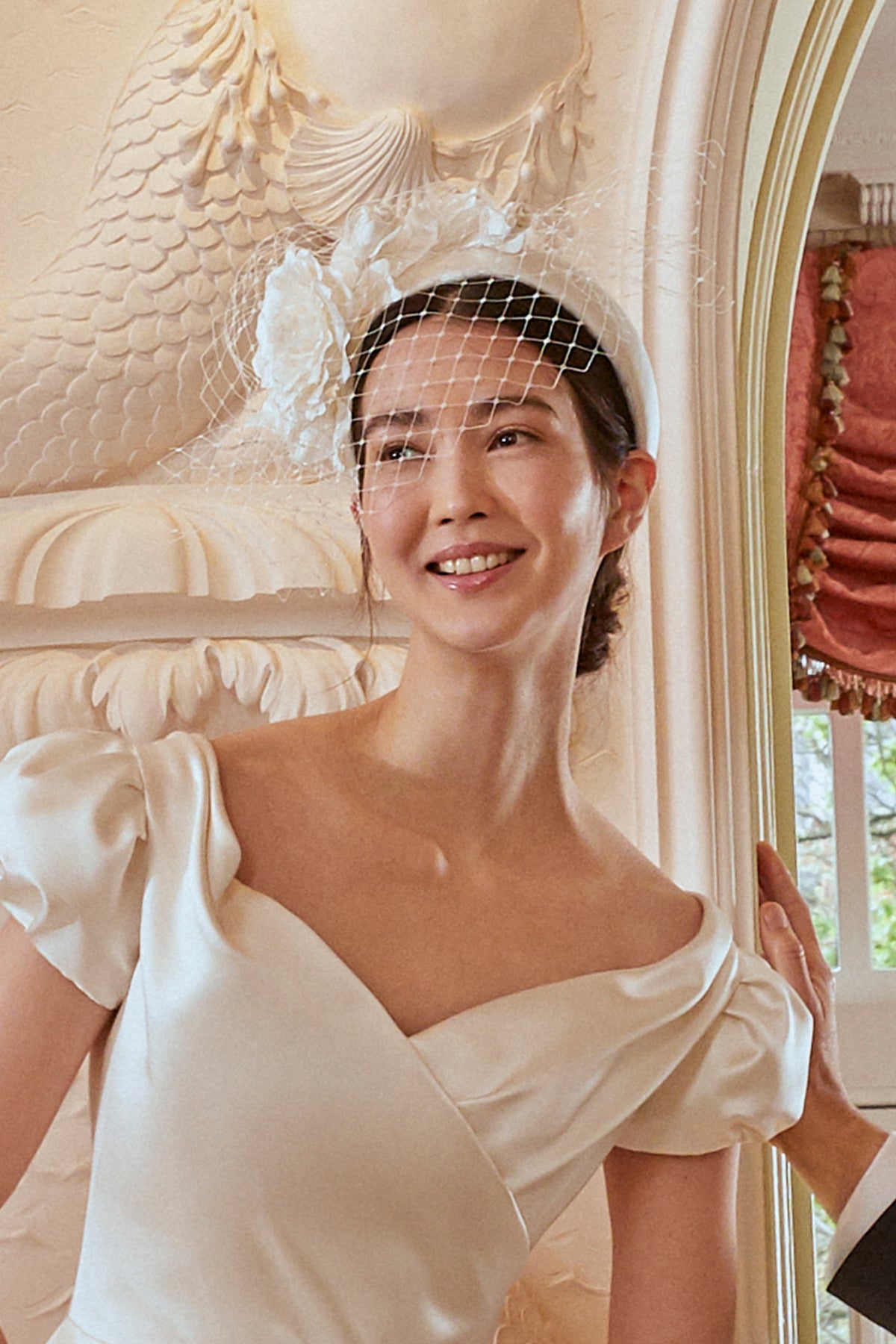 IVORY DUCHESS SATIN COVERED COUTURE HEADBAND WITH ROSE DETAILING AND A BIRDCAGE VEIL - Lock & Co. Hatters London UK
            