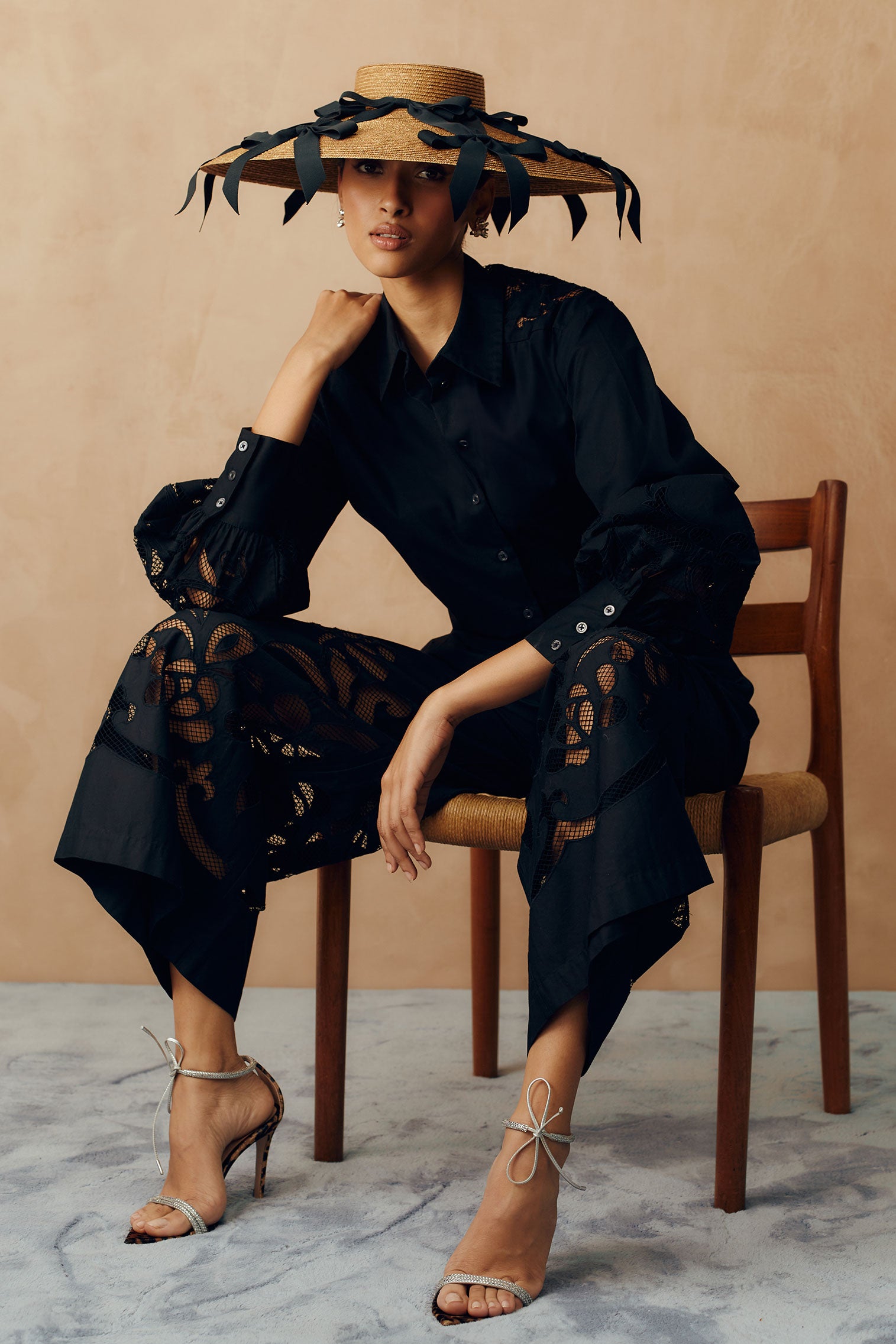 Golden wide brim percher with black grosgrain ribbons