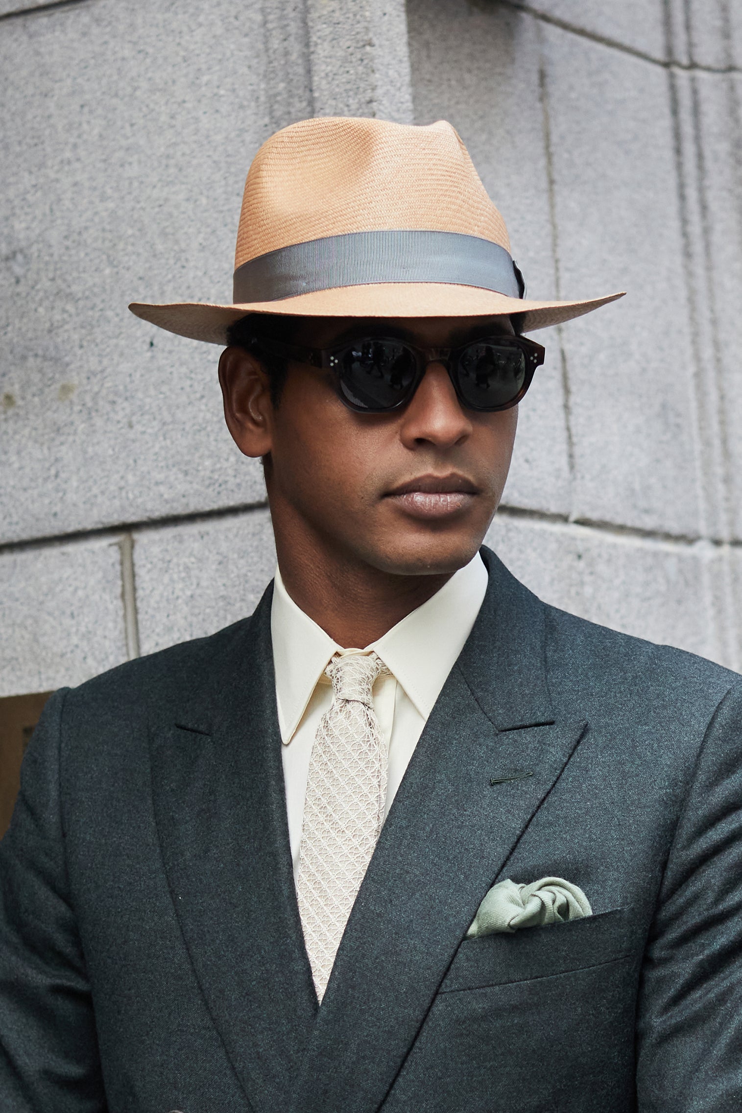 TOQUILLA PALM STRAW MOCHA PANAMA HAT WITH A METAL GROSGRAIN BAND AND BOW