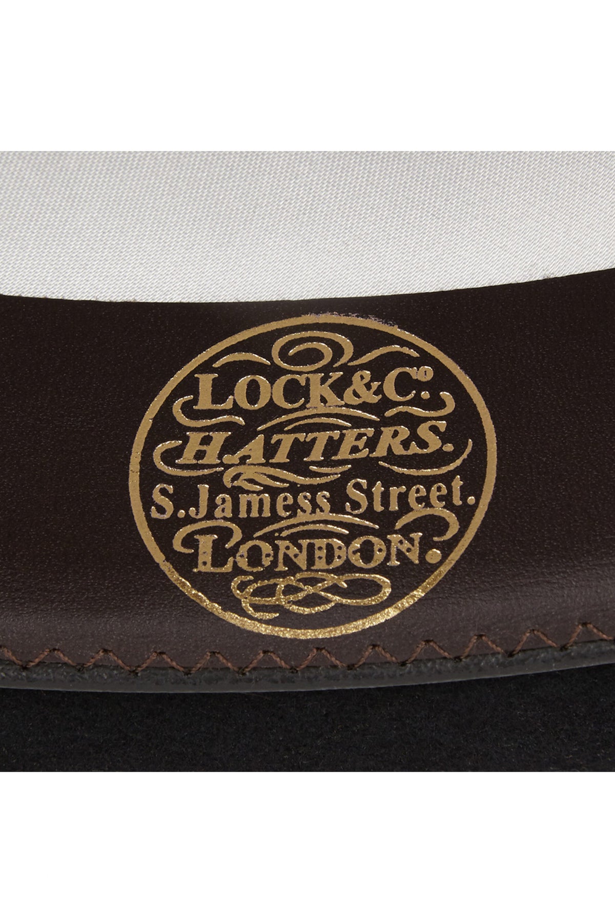 GOLDEN LOCK &amp; CO. HATTERS LOGO ON LEATHER SWEATBAND INSIDE HAT - Lock & Co. Hatters London UK
            