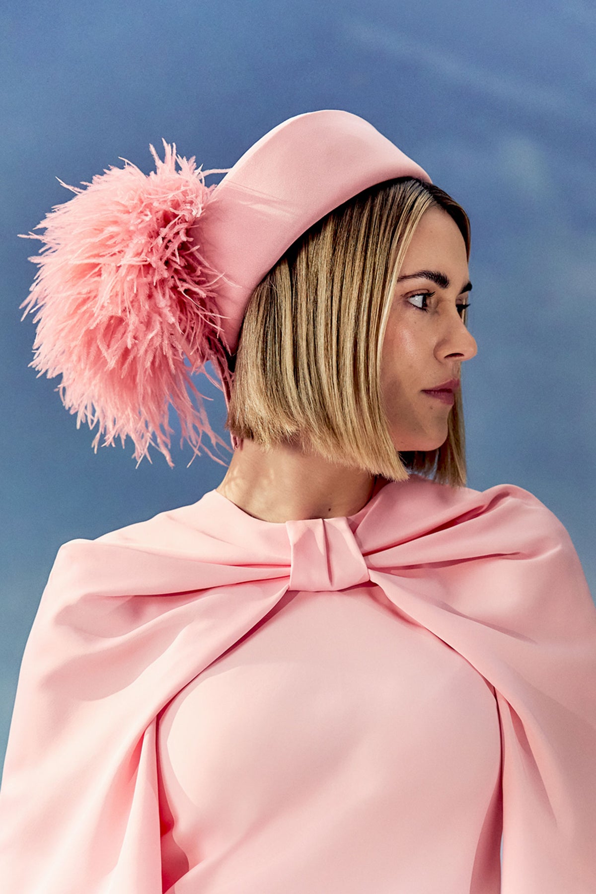 Women's pink silk Pillbox Hat with back ostrich feathers and a silk back bow