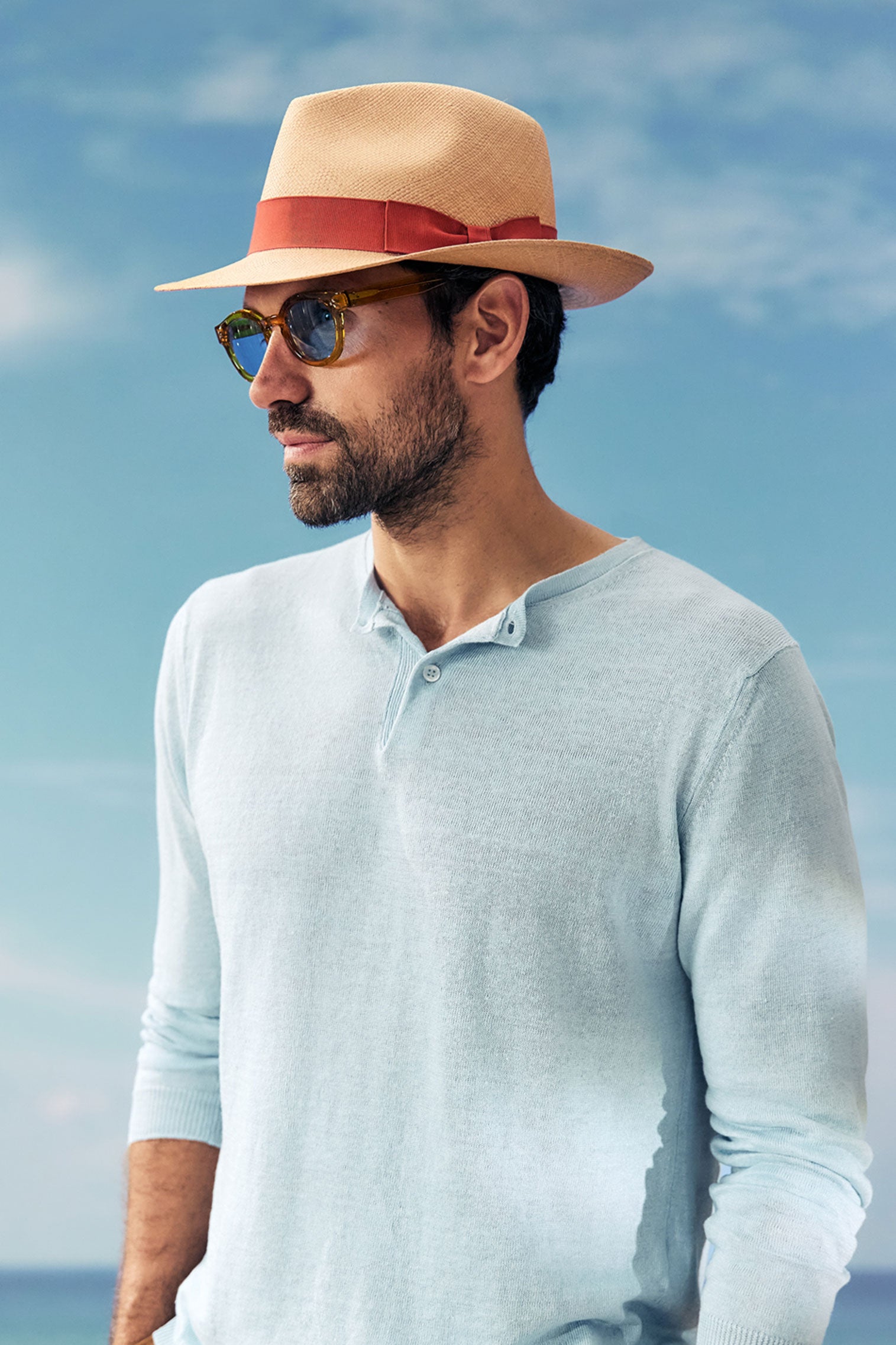 Unisex natural toquilla straw panama hat with a rust galoon ribbon