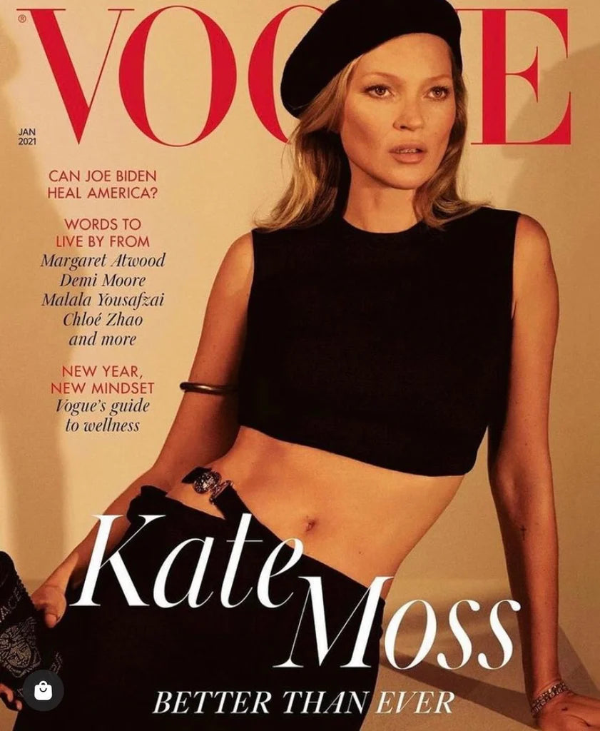 Kate Moss wearing Lock & Co. Hatters French style black wool felt beret. 