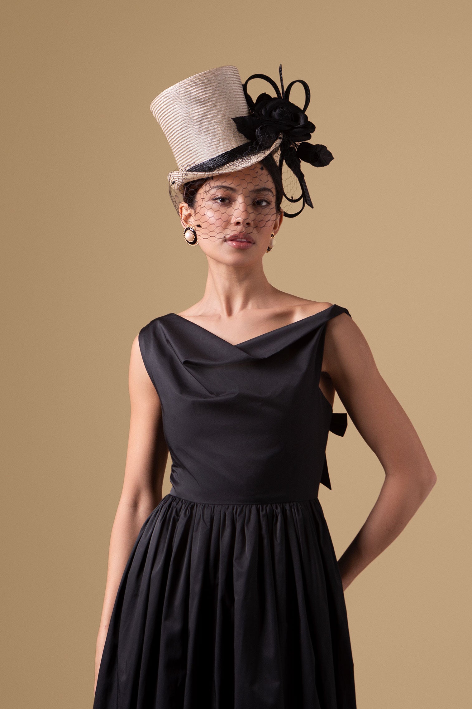 Womens natural parasisal straw top hat with black vintage veiling, silk camellias & straw loops