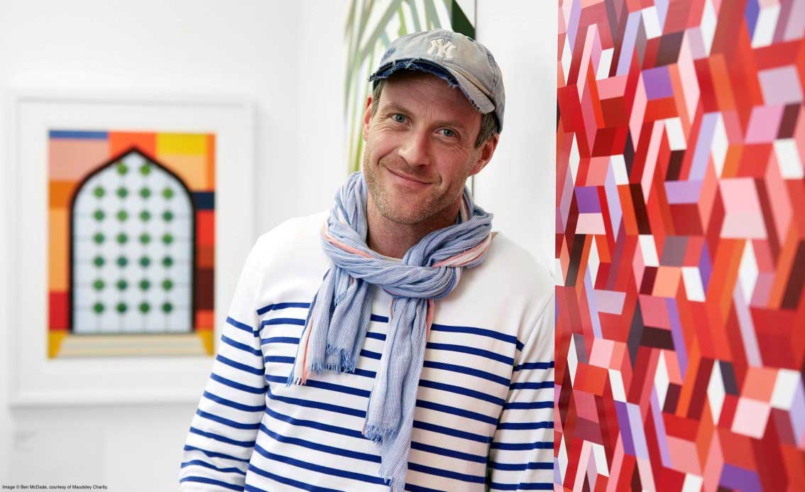 Martin Wade the artist at his exhibition