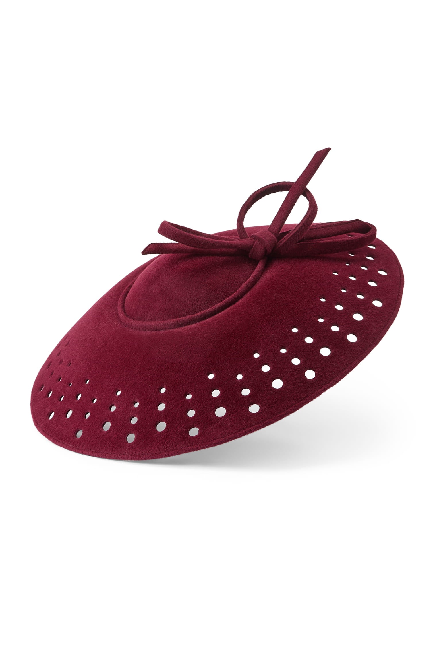 Couture burgundy velour felt saucer hat with punched holes on the brim and a matching bow on top