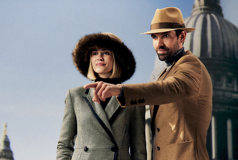 Men's ultrafine wool camel fedora hat with a brown grosgrain ribbon and bow. Women's Estate beige tweed winter hat with a brown faux fur brim. 