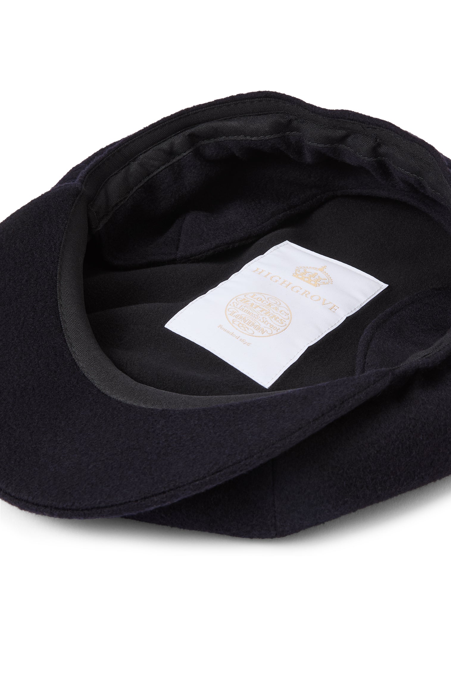 INSIDE OF NAVY CASHMERE 8 PANEL BAKERBOY CAP WITH EAR FLAPS