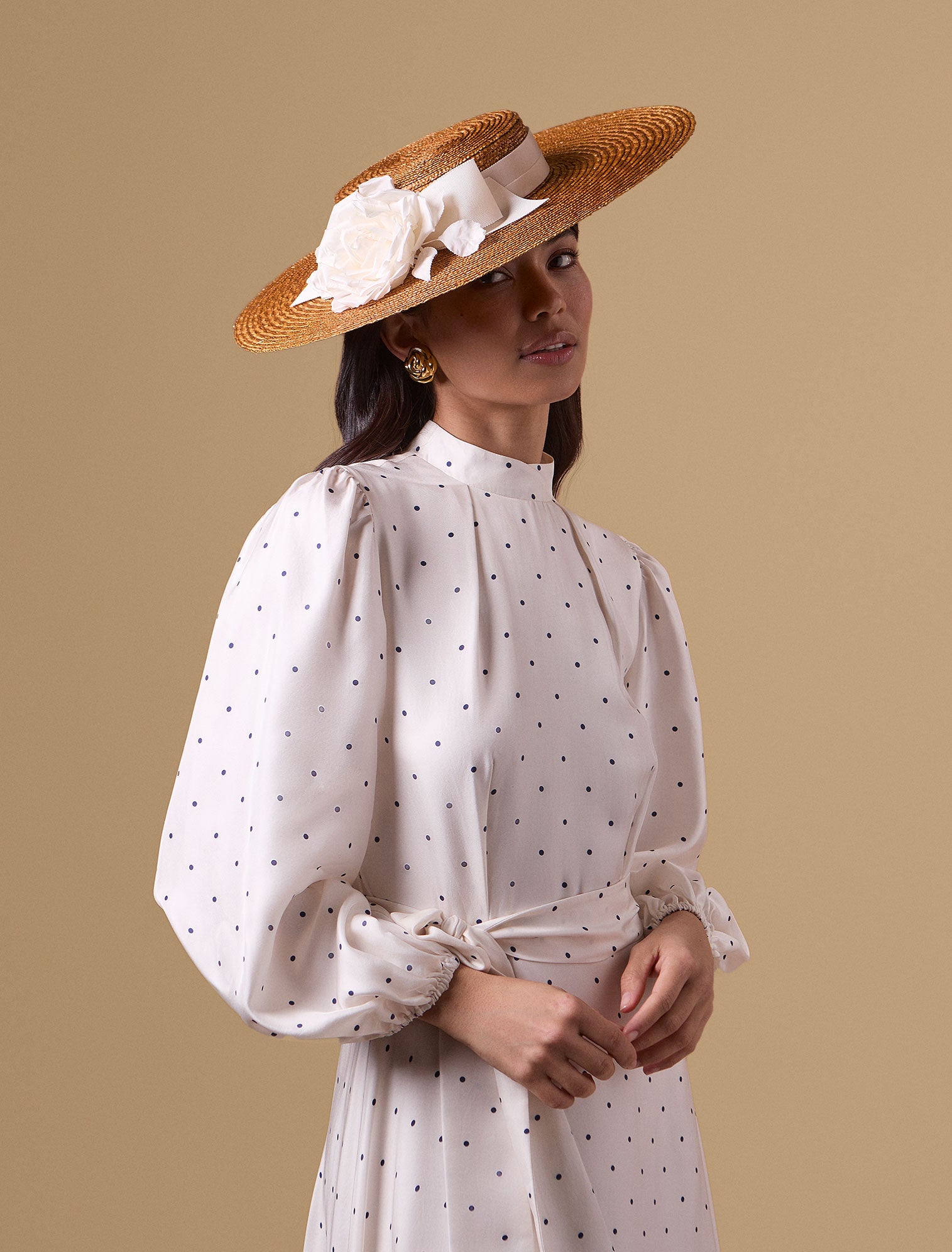 Golden pedal straw boater hat with silk dupion roses and an ivory trimband and bow