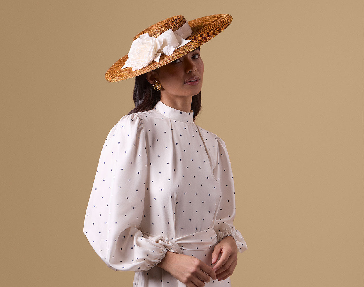 Golden pedal straw boater hat with silk dupion roses and an ivory trimband and bow