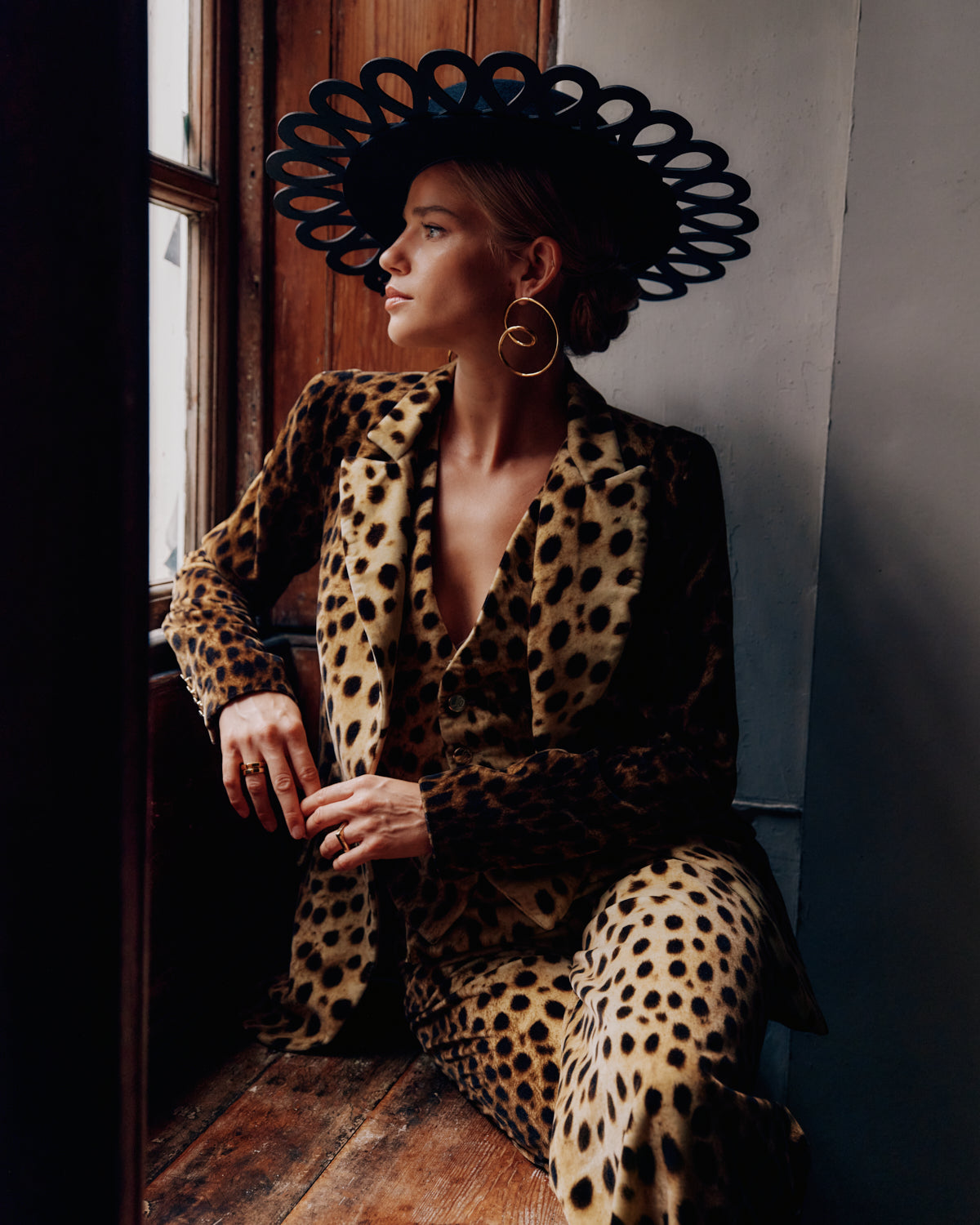 Black felt boater hat with a laser-cut leather wide brim  - Lock & Co. Hatters London UK
            