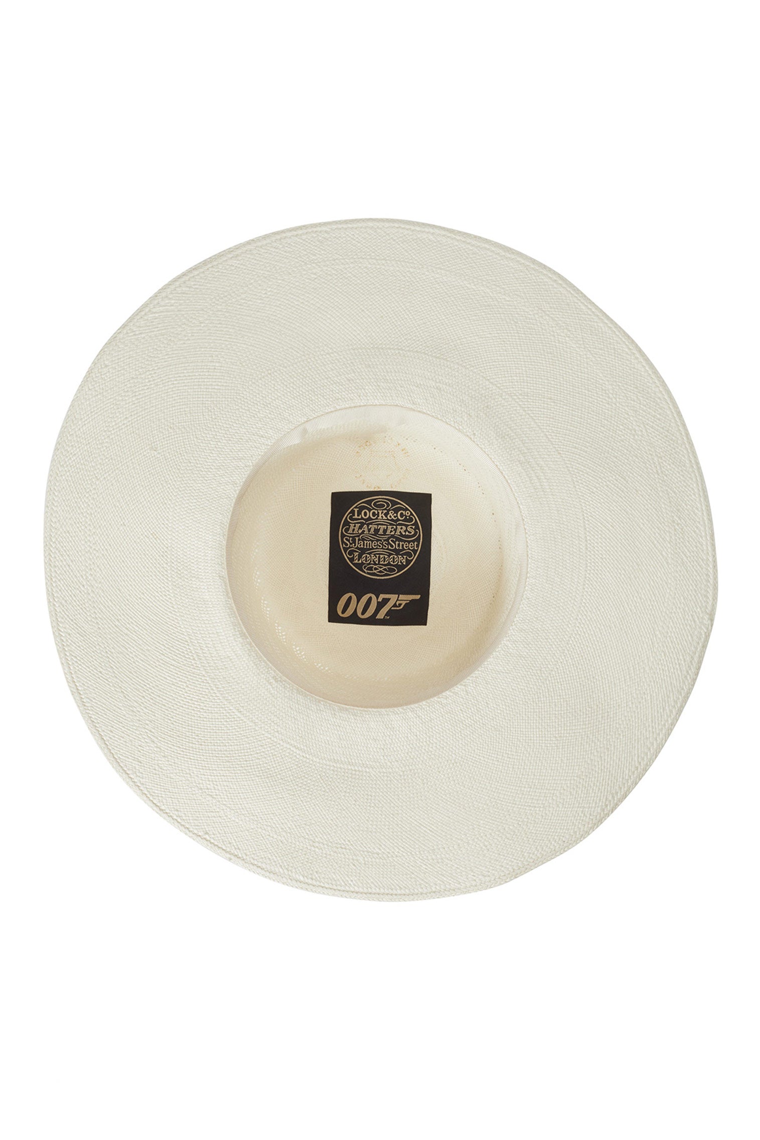 INSIDE OF WHITE PANAMA HAT FROM THE LOCK & CO. HATTERS X 007 BOND COLLECTION WITH BLACK & GOLD LOCK & CO. HATTERS X 007 LOGO