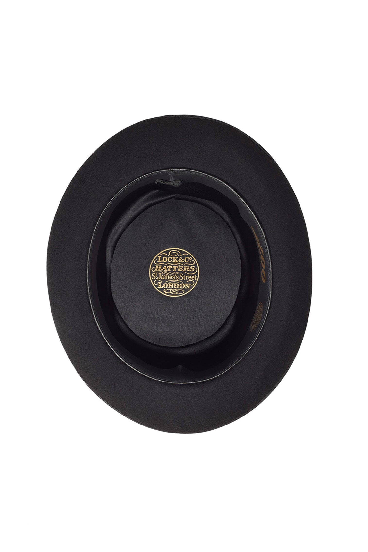 INSDIE OF BLACK ESCORIAL WOOL SQUARE-TOP BOWLER HAT FROM THE LOCK & CO. HATTERS X 007 BOND COLLECTION WITH GOLDEN LOCK & CO. LOGO ON BLACK LINING