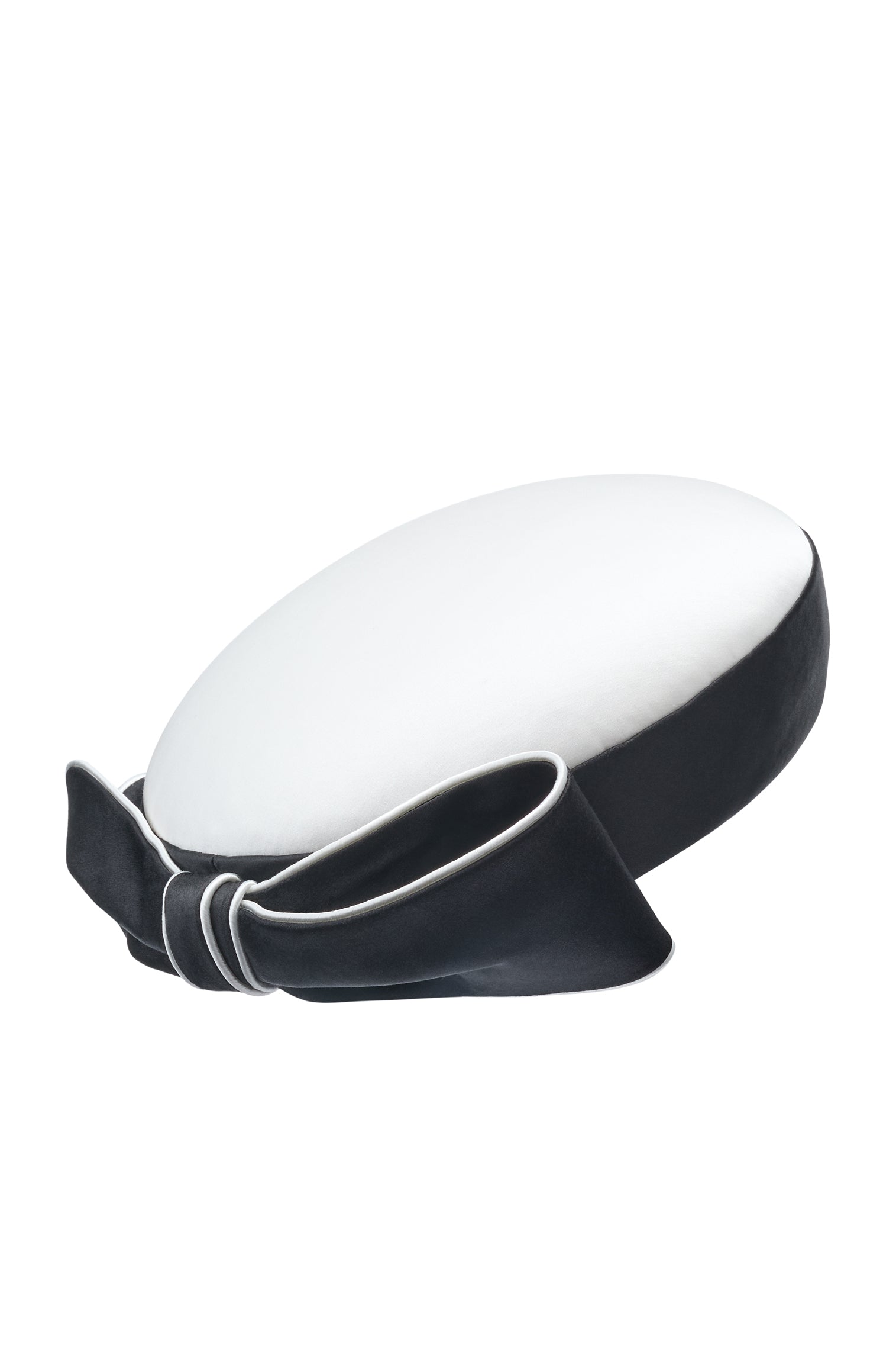 Black and white duchess satin pillbox hat with bow detail at the back